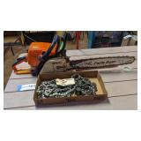 Stihl chain saw with extra chains