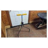 Adjustable height material stand