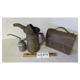 Oil cans and metal lunch box
