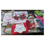 Lots of tablecloths, silky linen, material