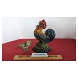 Iron door stop and small brass chicken