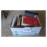 Box of notebooks and paper