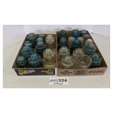 2 boxes glass insulators