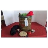 Tin full of sewing and yarn supplies