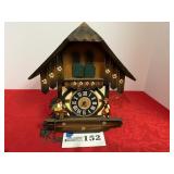 White and brown Cuckoo clock