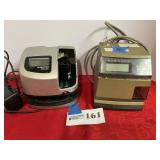 2 electronic time clocks