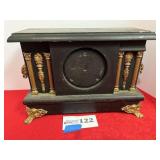 Empty black mantel case