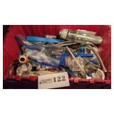 Tote w/asst. plumbing items