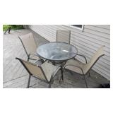 Round patio table and 4 chairs