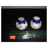 Pink flowers with blue shades Salt and Pepper