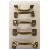 FIVE BRASS HANDLES