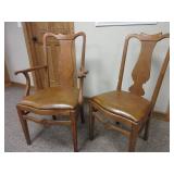 Vintage chairs with leather covered seats