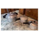 Three Pressure Cookers NOTE One missing the