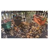 Green Planter and Three Plastic Planters