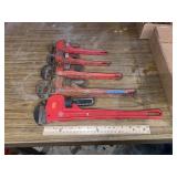 Five Pipe Wrenches; Two 10-Inches, One 12-Inch,