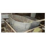 Two Rubbermaid Stock Tanks