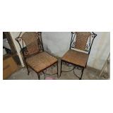 Two Wrought Iron & Wicker Chairs