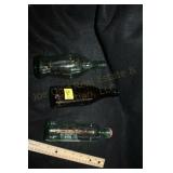 3 Odd Coca Cola Bottles