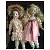 Pair of Older  Porcelain Dolls