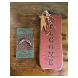 Two Painted Wood Welcome Signs