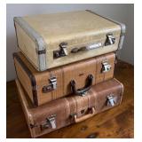 Three Medium Sized Antique Suitcases