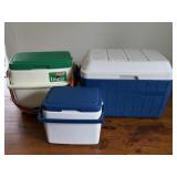 Two Small Hard Plastic Coleman Coolers