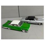 Two Maisto 1/26 Scale Model Cars