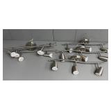 Four Ceiling Mount Positionable Light Fixtures