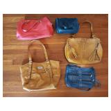Four Adorable Hand Bags with One Navy Blue Makeup
