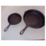 Two Round Cast Iron Skillets (Needs to Be