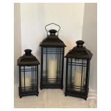Set of three metal lanterns