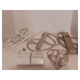 Assortment of Power Extension Cords and Wall