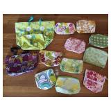 Several Adorable Clinique Bags Different Sizes
