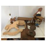 Vintage wooden decor.  Shelves, horseï¿½s etc