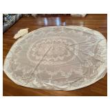 Vintage lace tablecloth and extra lace pieceï¿½s.