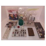 collection of vintage sewing supplies, including