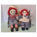 Vintage Raggedy Anne and Raggedy Andy on a Wooden
