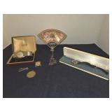 Assortment of watches,tie clip, and oriental box