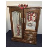 Jewelry box with assortment of red beaded Jewelry