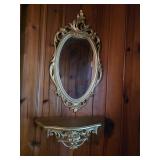 Vintage gold tone mirror with matching shelve