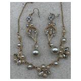 Gold tone bridal jewelry set featuring faux