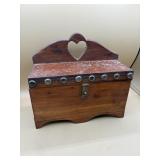 vintage wooden jewelry or trinket chest, often
