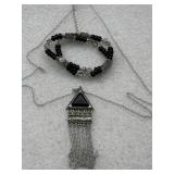 metal mesh pendant featuring a triangle design