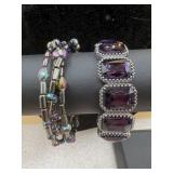 two bracelets, one with multi-colored iridescent