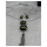 long silver-toned chain necklace with a green