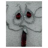 silver-toned necklace and dangle earring set