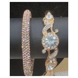 rose gold colored bangle covered in rhinestones