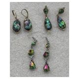 Metro Momentum' oil spill earrings featuring