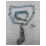 jewelry set features light blue gemstone beads