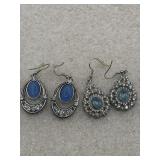 Serene Shimmer Blue Earrings featuring blue cat's